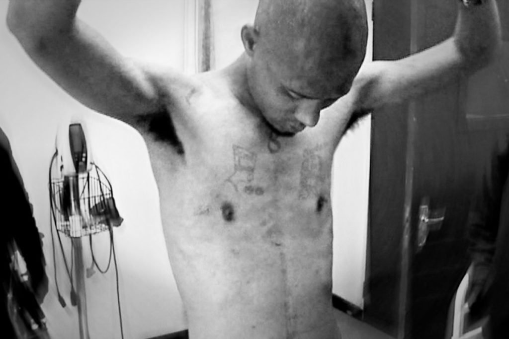 Gershwin Coutts, an inmate at Mangaung Prison, claims to have been assaulted by the prison’s emergency security team. Sometimes the guards would force the inmates to strip, before pouring cold water on them and shocking them with electric shields.
