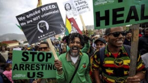 Weed out arrests: Demonstrators in Cape Town march for the legalisation of dagga. (Mike Hutchings/Reuters)