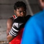 11 July 2019: Princess Oluwapelumi Adewale, a 17-year-old boxer in a training session with her coach at the National Stadium in Lagos, Nigeria.