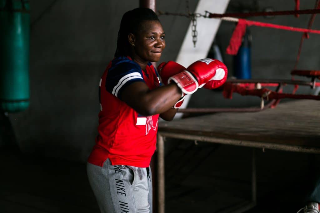 11 July 2019: Edith Agu Ogoke, warms up for sparring in the National Stadium gym, Lagos, Nigeria